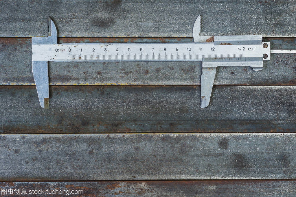 測量工具,金屬背景。背景紋理